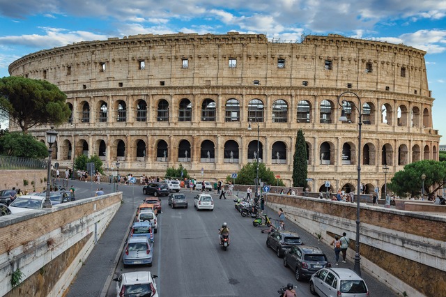 Colosseum and City Life - Rome, Italy