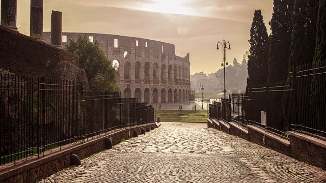 Colosseum at Sunrise - View from Ancient Roman Street
